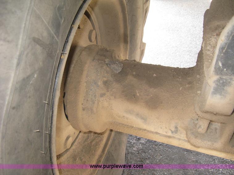 image for item J2903 Caterpillar M318C rubber tire excavator