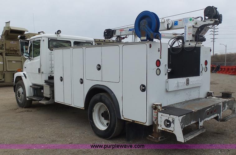 image for item K1293 1999 Freightliner FL70 service truck with crane