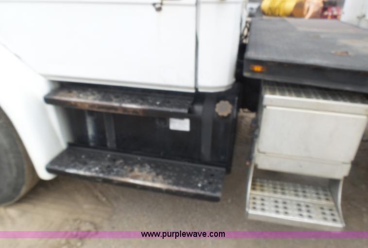 image for item K1293 1999 Freightliner FL70 service truck with crane