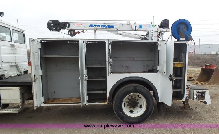 image for item K1293 1999 Freightliner FL70 service truck with crane