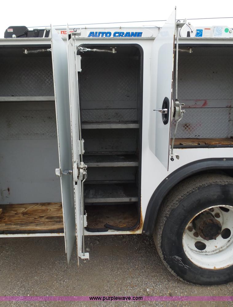 image for item K1293 1999 Freightliner FL70 service truck with crane