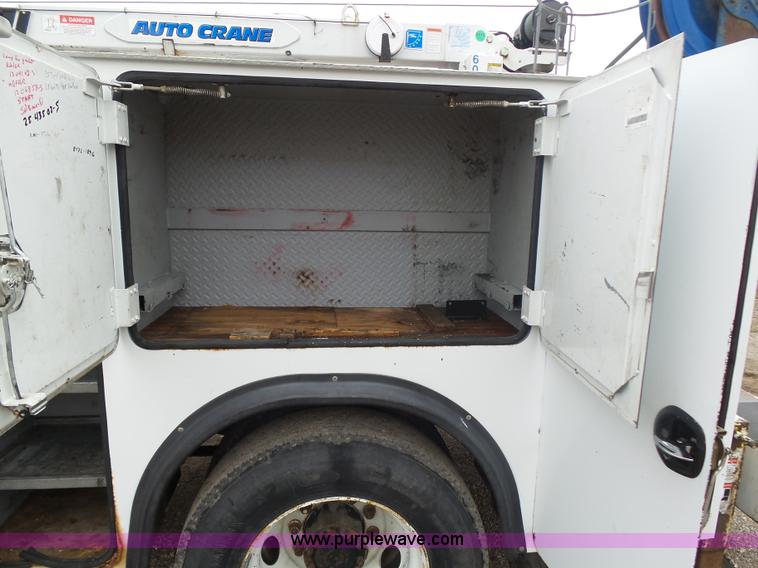 image for item K1293 1999 Freightliner FL70 service truck with crane