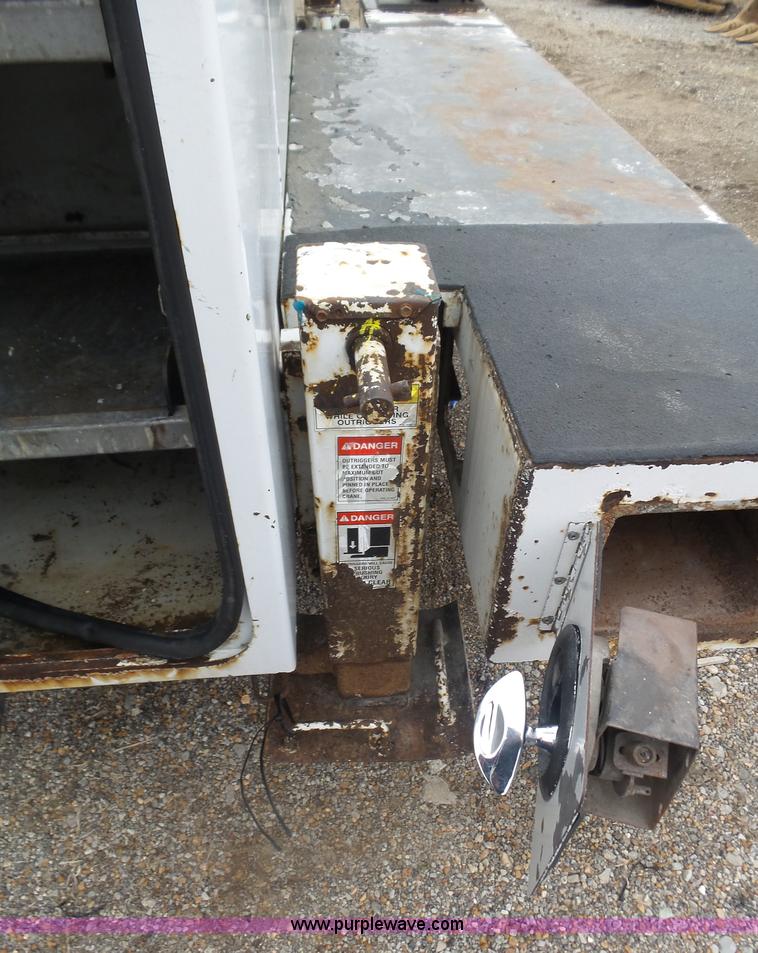 image for item K1293 1999 Freightliner FL70 service truck with crane