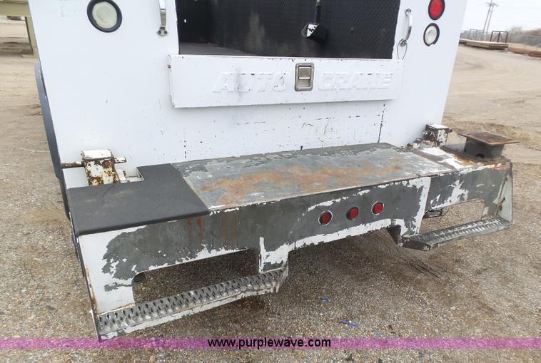 image for item K1293 1999 Freightliner FL70 service truck with crane