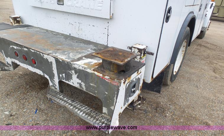 image for item K1293 1999 Freightliner FL70 service truck with crane