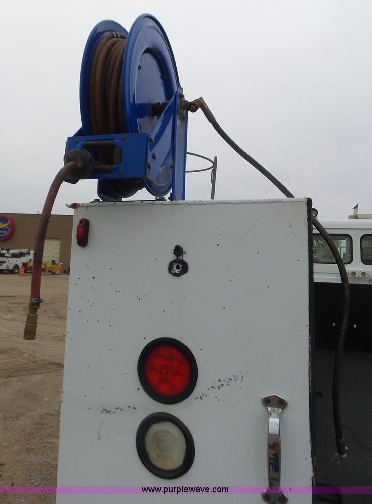 image for item K1293 1999 Freightliner FL70 service truck with crane