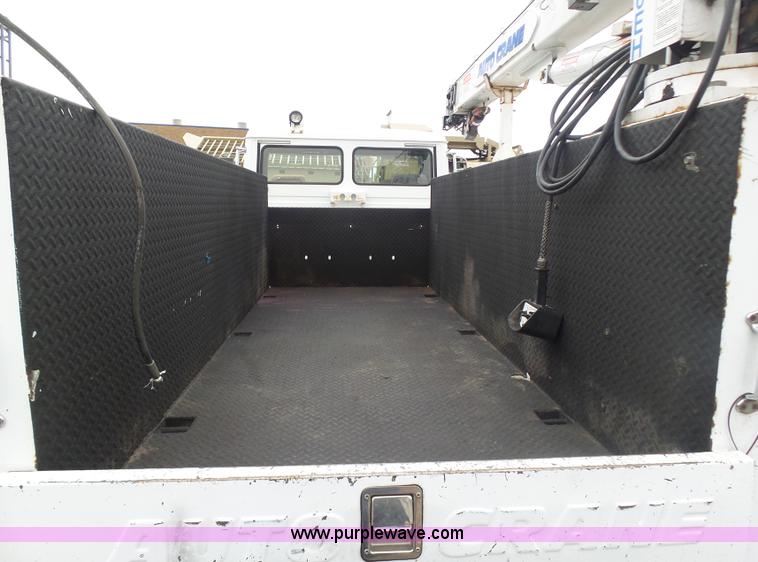 image for item K1293 1999 Freightliner FL70 service truck with crane