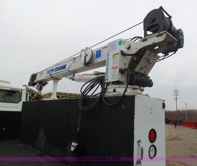 image for item K1293 1999 Freightliner FL70 service truck with crane