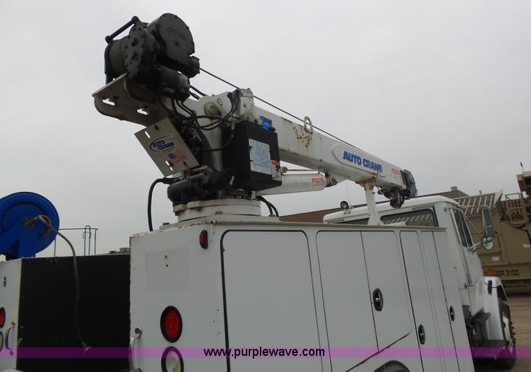 image for item K1293 1999 Freightliner FL70 service truck with crane