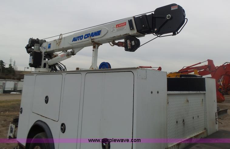 image for item K1293 1999 Freightliner FL70 service truck with crane