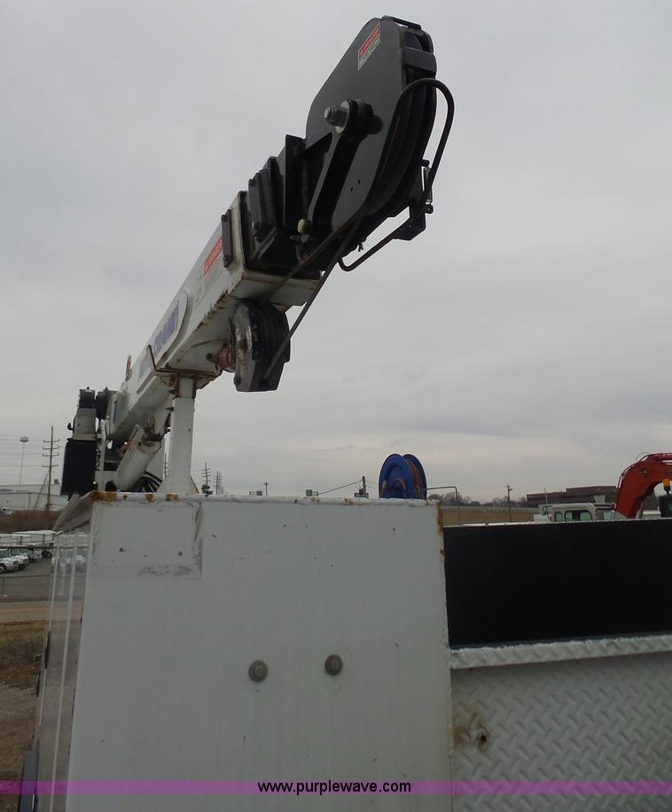 image for item K1293 1999 Freightliner FL70 service truck with crane