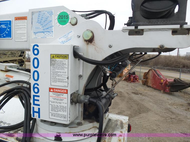 image for item K1293 1999 Freightliner FL70 service truck with crane