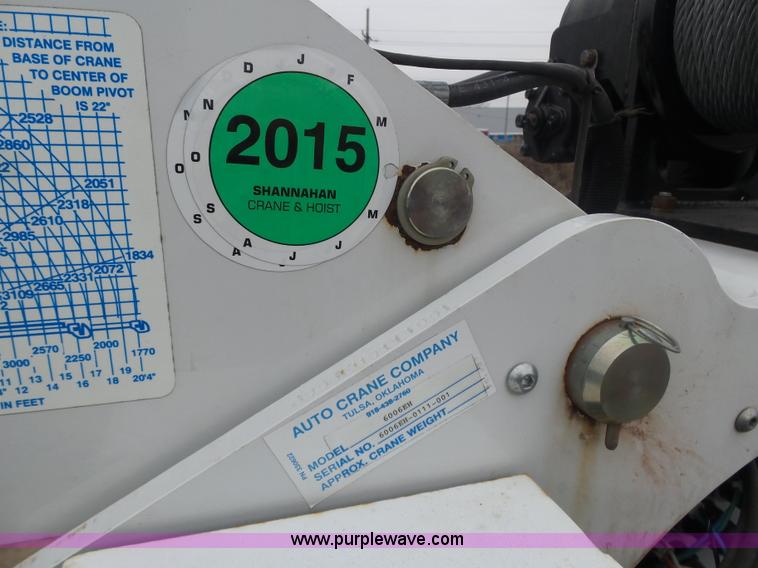 image for item K1293 1999 Freightliner FL70 service truck with crane