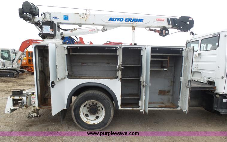 image for item K1293 1999 Freightliner FL70 service truck with crane