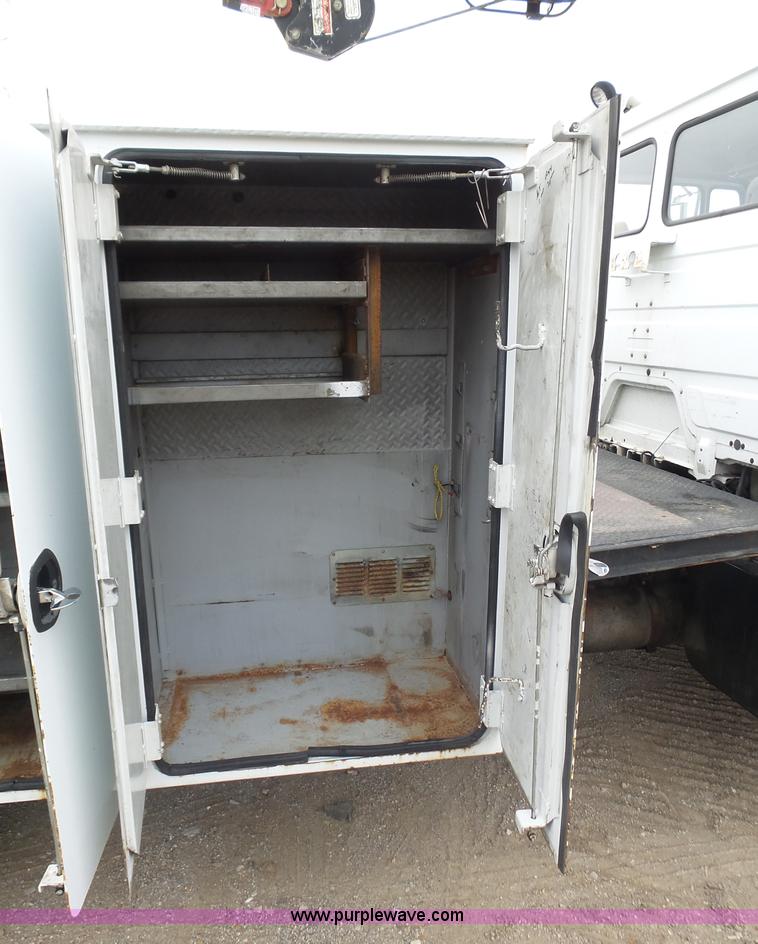 image for item K1293 1999 Freightliner FL70 service truck with crane