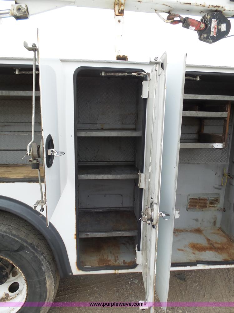 image for item K1293 1999 Freightliner FL70 service truck with crane