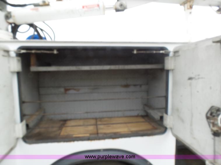 image for item K1293 1999 Freightliner FL70 service truck with crane