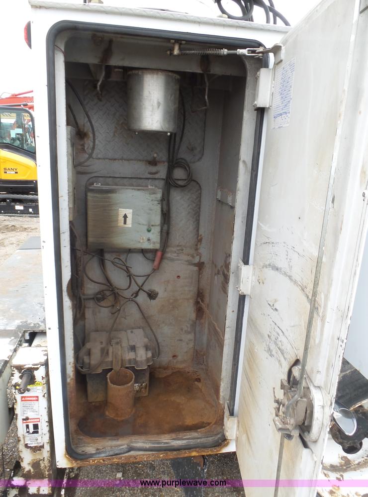 image for item K1293 1999 Freightliner FL70 service truck with crane