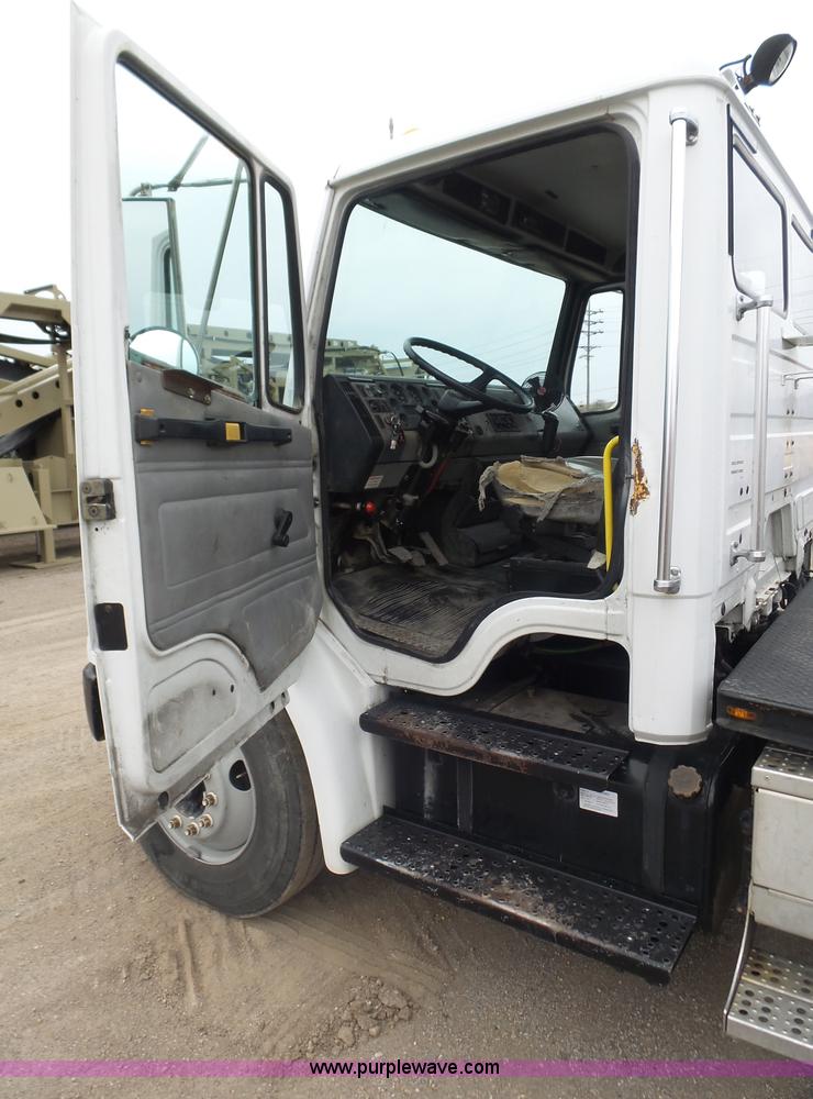 image for item K1293 1999 Freightliner FL70 service truck with crane