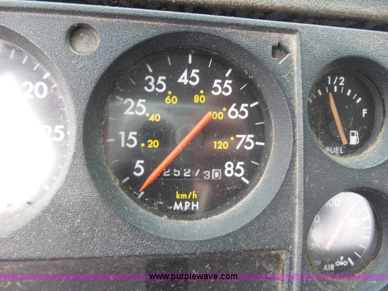 image for item K1293 1999 Freightliner FL70 service truck with crane