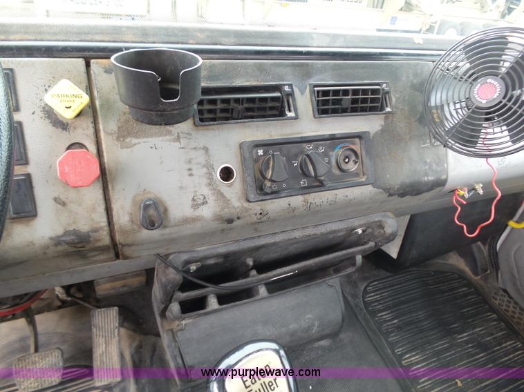 image for item K1293 1999 Freightliner FL70 service truck with crane