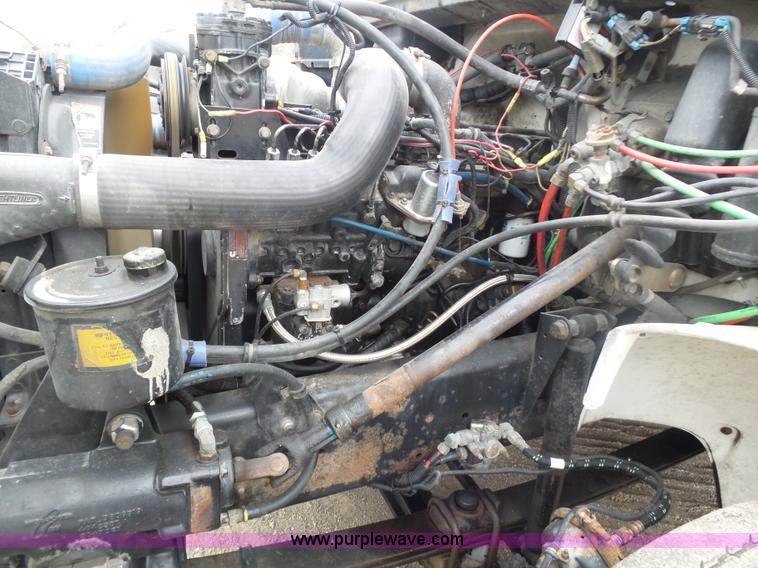 image for item K1293 1999 Freightliner FL70 service truck with crane