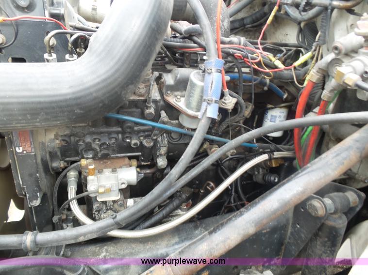 image for item K1293 1999 Freightliner FL70 service truck with crane