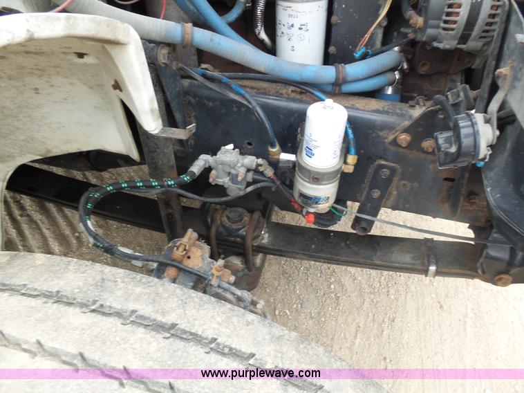 image for item K1293 1999 Freightliner FL70 service truck with crane