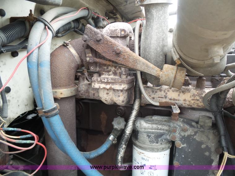 image for item K1293 1999 Freightliner FL70 service truck with crane