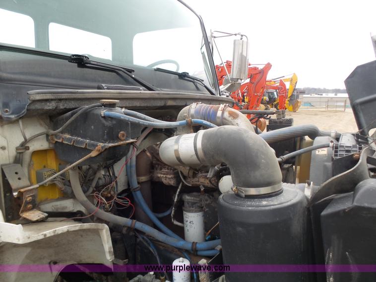 image for item K1293 1999 Freightliner FL70 service truck with crane