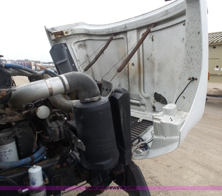 image for item K1293 1999 Freightliner FL70 service truck with crane