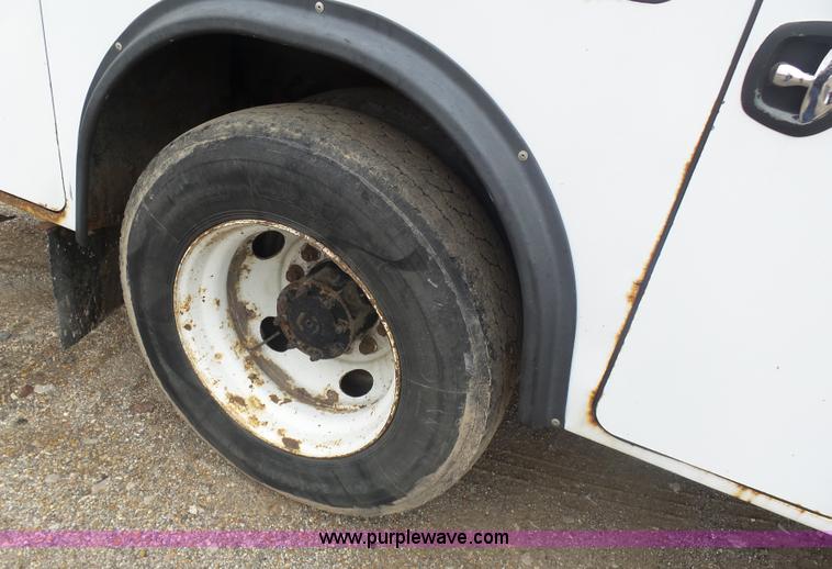 image for item K1293 1999 Freightliner FL70 service truck with crane