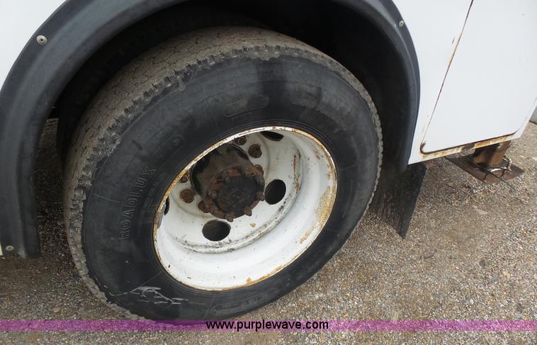 image for item K1293 1999 Freightliner FL70 service truck with crane