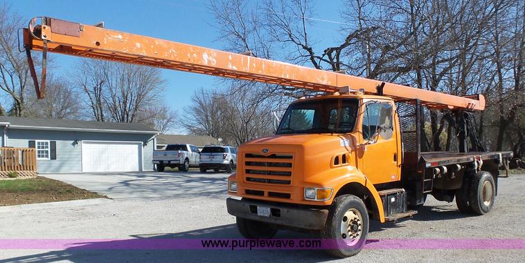 image for item K1311 1998 Ford L8501 Louisville 101 flatbed truck