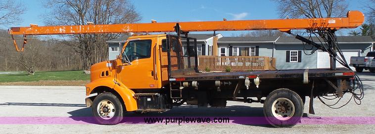 image for item K1311 1998 Ford L8501 Louisville 101 flatbed truck