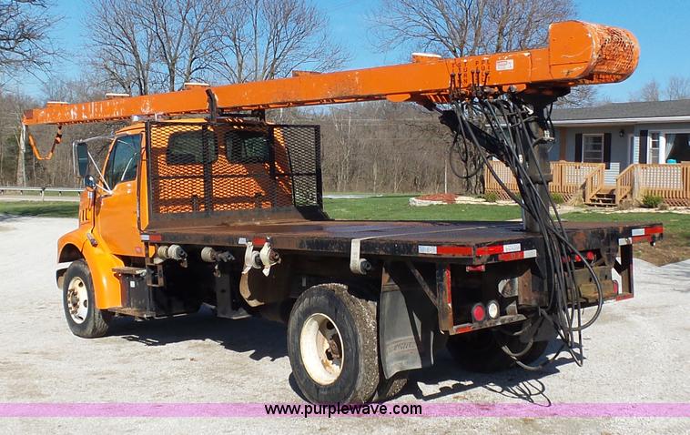 image for item K1311 1998 Ford L8501 Louisville 101 flatbed truck