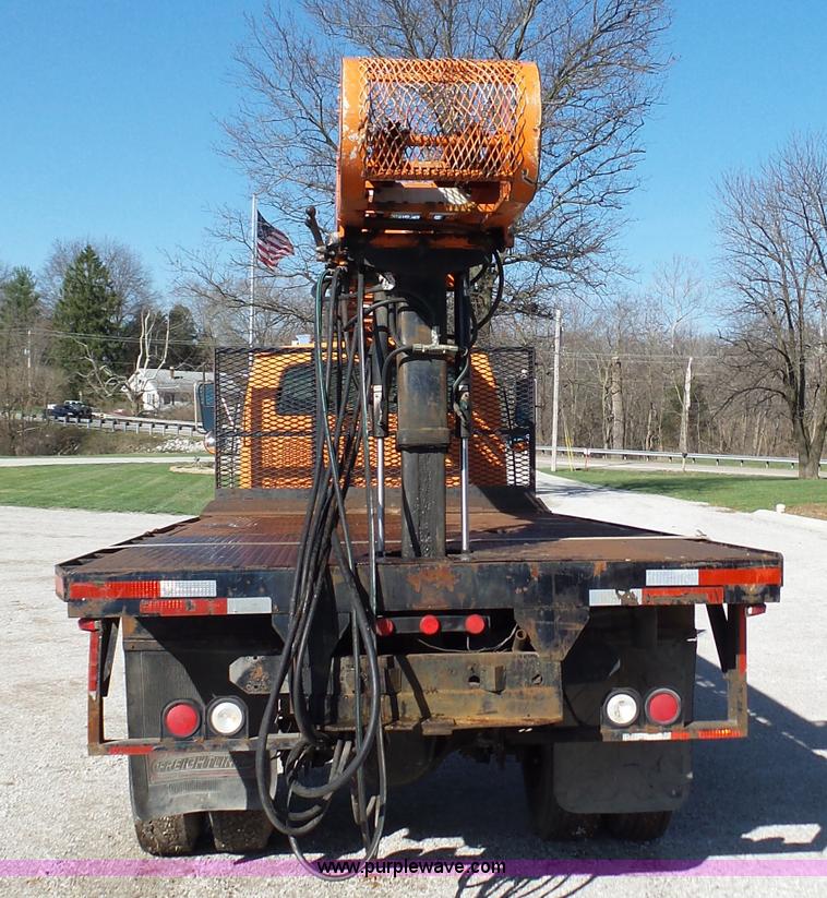 image for item K1311 1998 Ford L8501 Louisville 101 flatbed truck