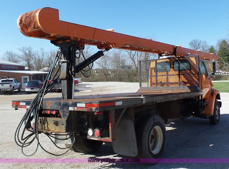 image for item K1311 1998 Ford L8501 Louisville 101 flatbed truck