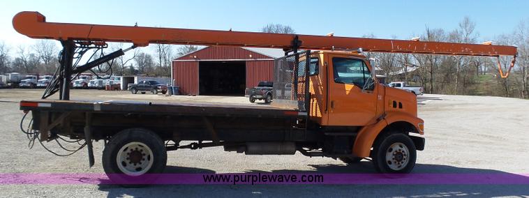 image for item K1311 1998 Ford L8501 Louisville 101 flatbed truck