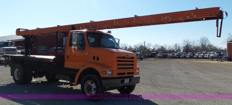 image for item K1311 1998 Ford L8501 Louisville 101 flatbed truck