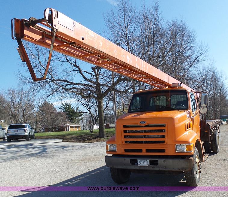 image for item K1311 1998 Ford L8501 Louisville 101 flatbed truck