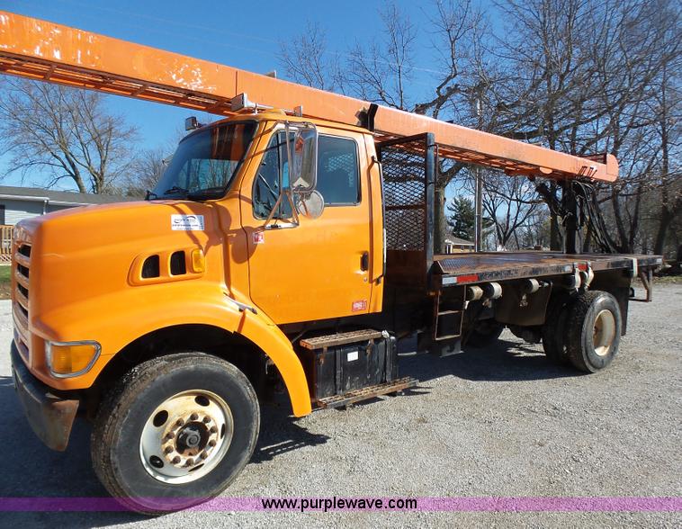 image for item K1311 1998 Ford L8501 Louisville 101 flatbed truck