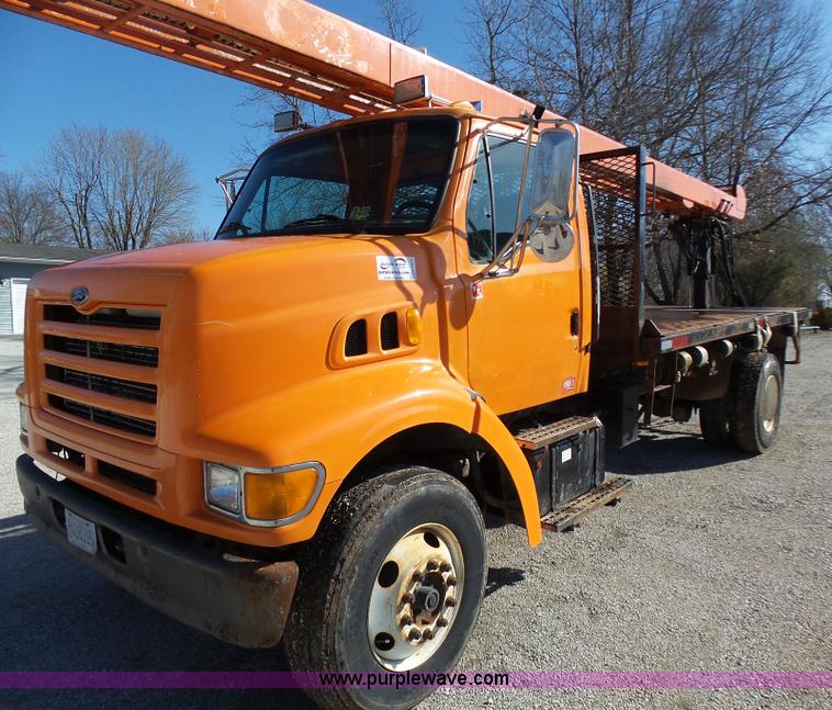 image for item K1311 1998 Ford L8501 Louisville 101 flatbed truck