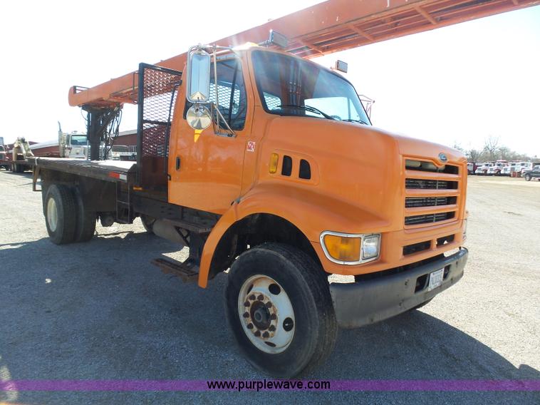 image for item K1311 1998 Ford L8501 Louisville 101 flatbed truck