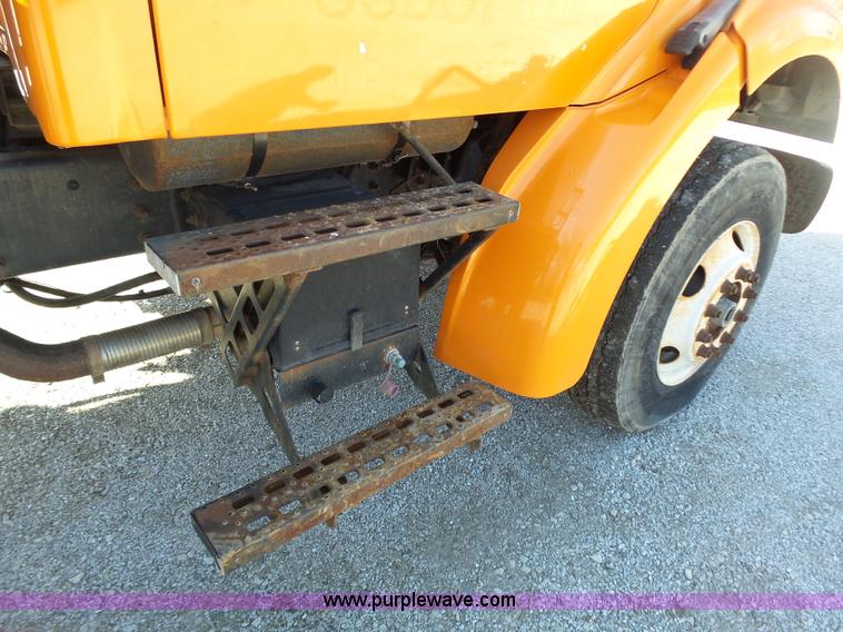 image for item K1311 1998 Ford L8501 Louisville 101 flatbed truck