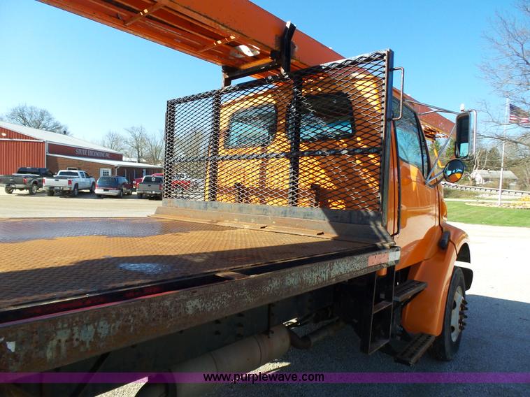 image for item K1311 1998 Ford L8501 Louisville 101 flatbed truck