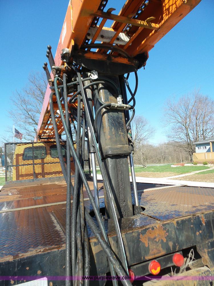 image for item K1311 1998 Ford L8501 Louisville 101 flatbed truck