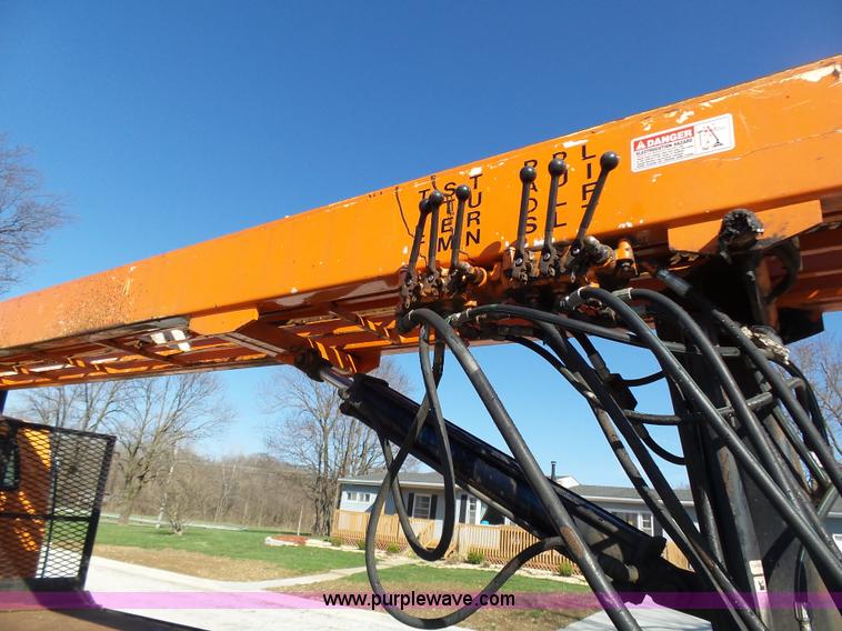 image for item K1311 1998 Ford L8501 Louisville 101 flatbed truck