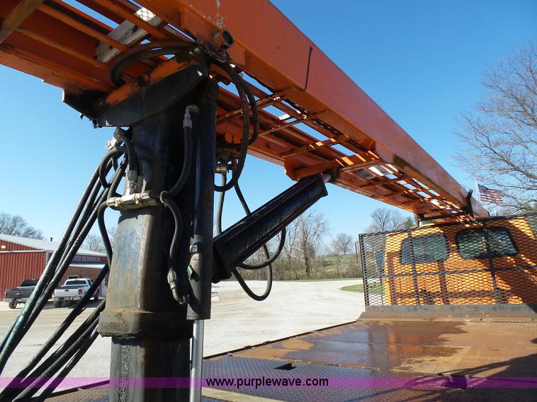 image for item K1311 1998 Ford L8501 Louisville 101 flatbed truck