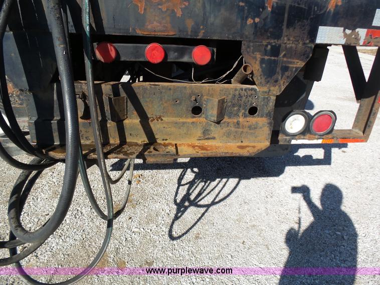 image for item K1311 1998 Ford L8501 Louisville 101 flatbed truck